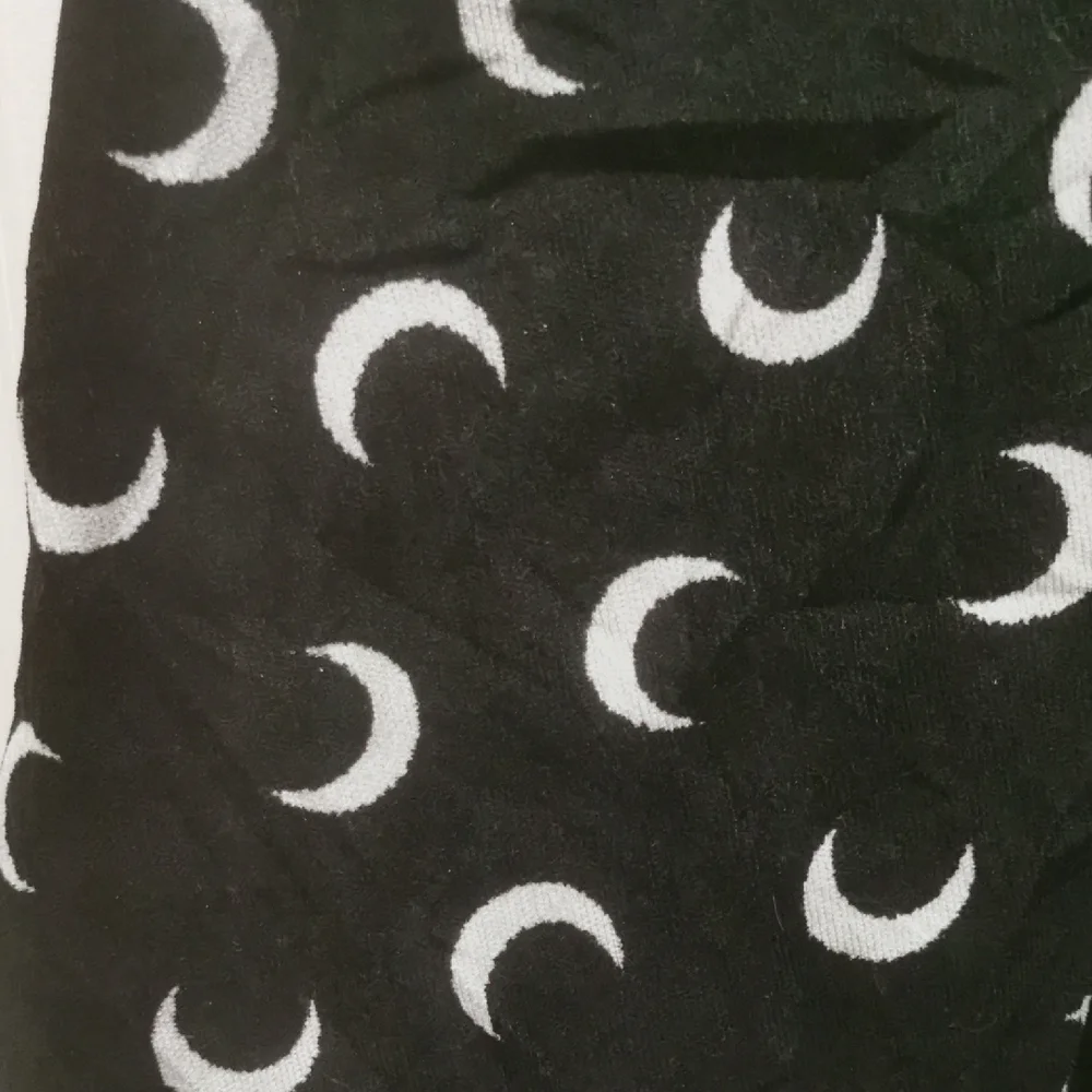 Stylish Black and White Mini Dress Cresent Moon, it has pockets. - Picture 4 of 7